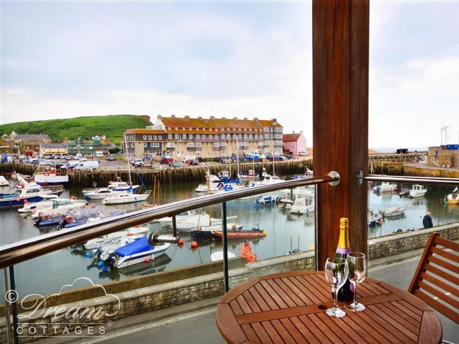 The Boardwalk Villa West Bay Bagian luar foto